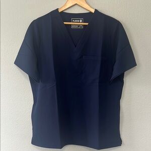 Woman’s PLEDGE Blue V-Neck Short Sleeve Shirt Scrub Top runs small‎